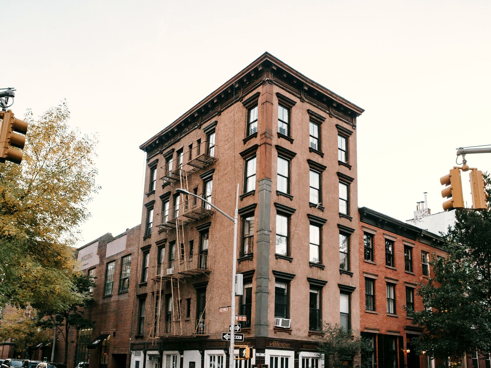 Corner brownstone building on a Brooklyn street